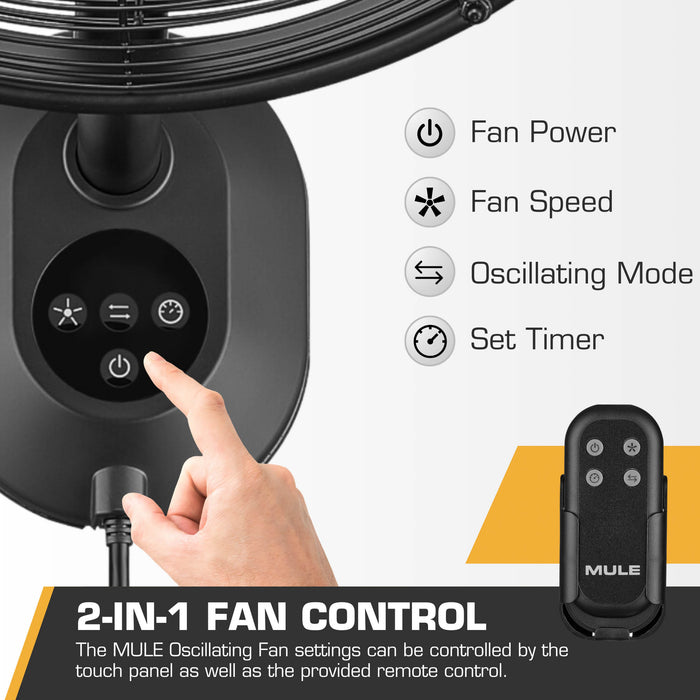 Hand operating a touch panel on a Mule fan with remote control and feature icons displayed.