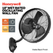 MULE Honeywell 18-inch wet-rated outdoor oscillating wall fan mounted, angled view